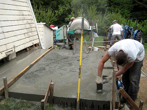 Wet cement filling the forms. -- 